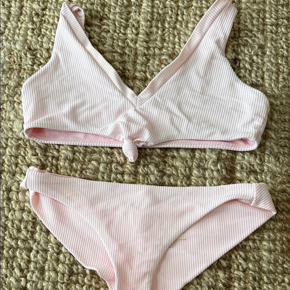 Frankie’s pink bikini.
